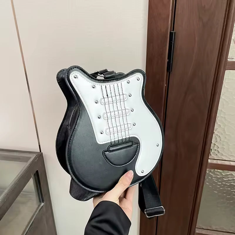 Black guitar shaped crossbody bag front view